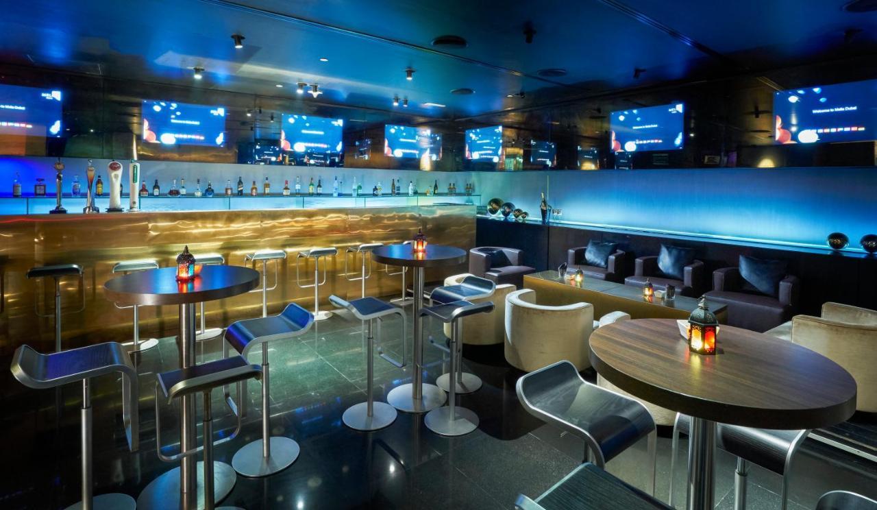The Canvas Dubai - Mgallery Hotel Collection Kültér fotó The interior of the bar